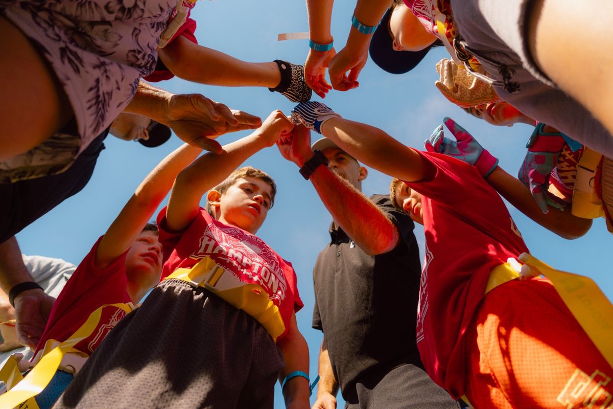 Team circle, hands in