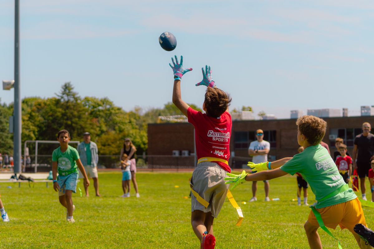 Receiver reaching for the ball