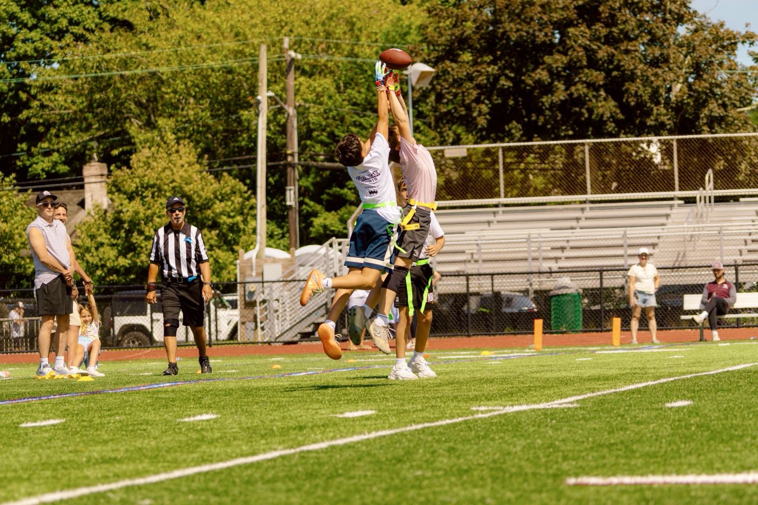 Two players leap for the ball